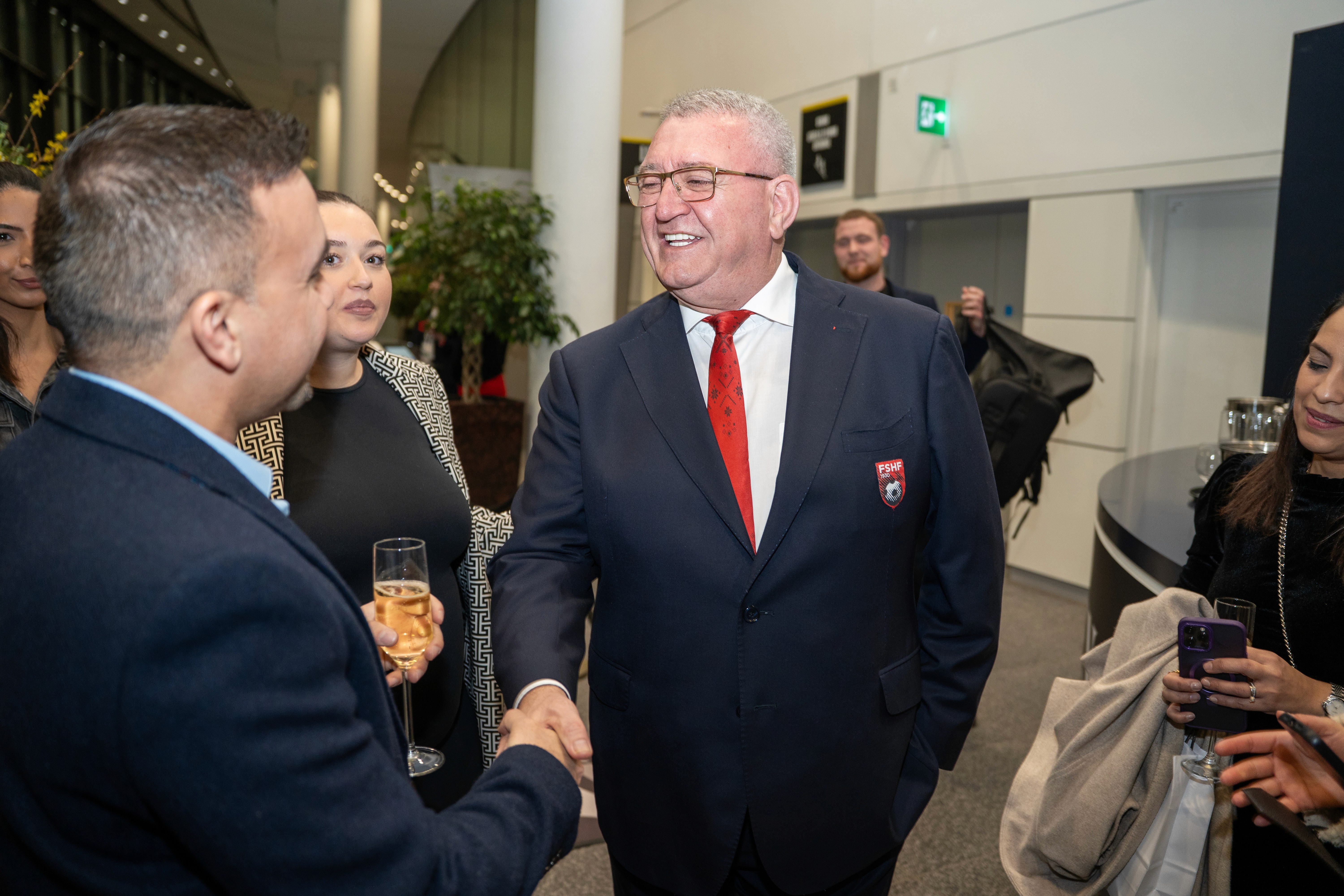 Group photo of all attendees at the Wembley Stadium elevated experience event, captured by Seven Media while filming and showcasing the exclusive membership experience on the pitch.