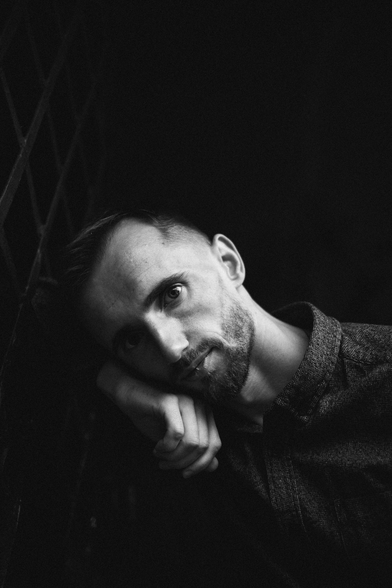 An orange cube-shaped side table is shown.