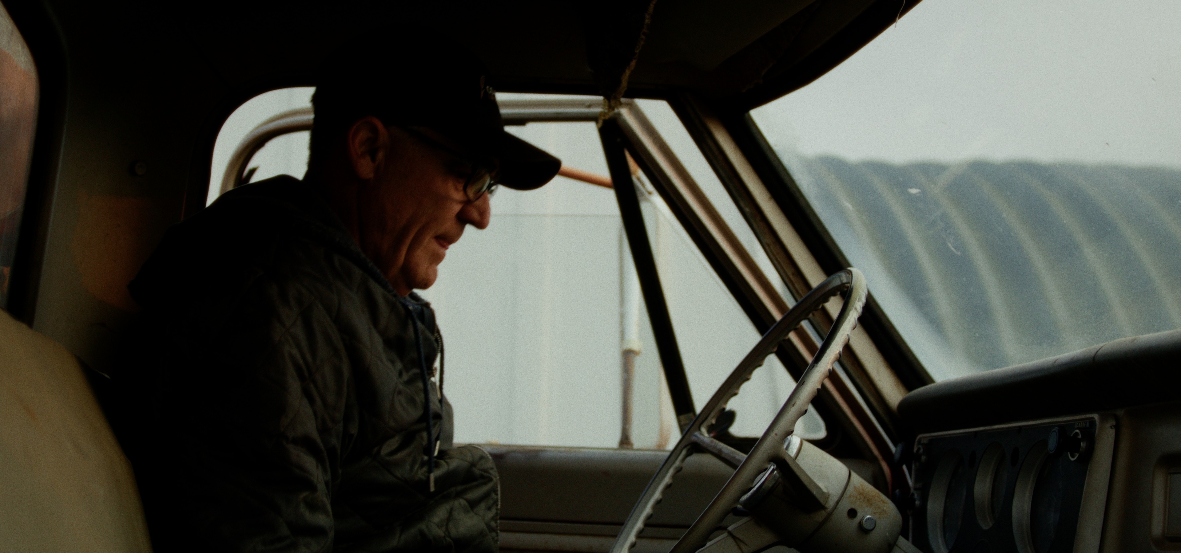farmer inside his truck