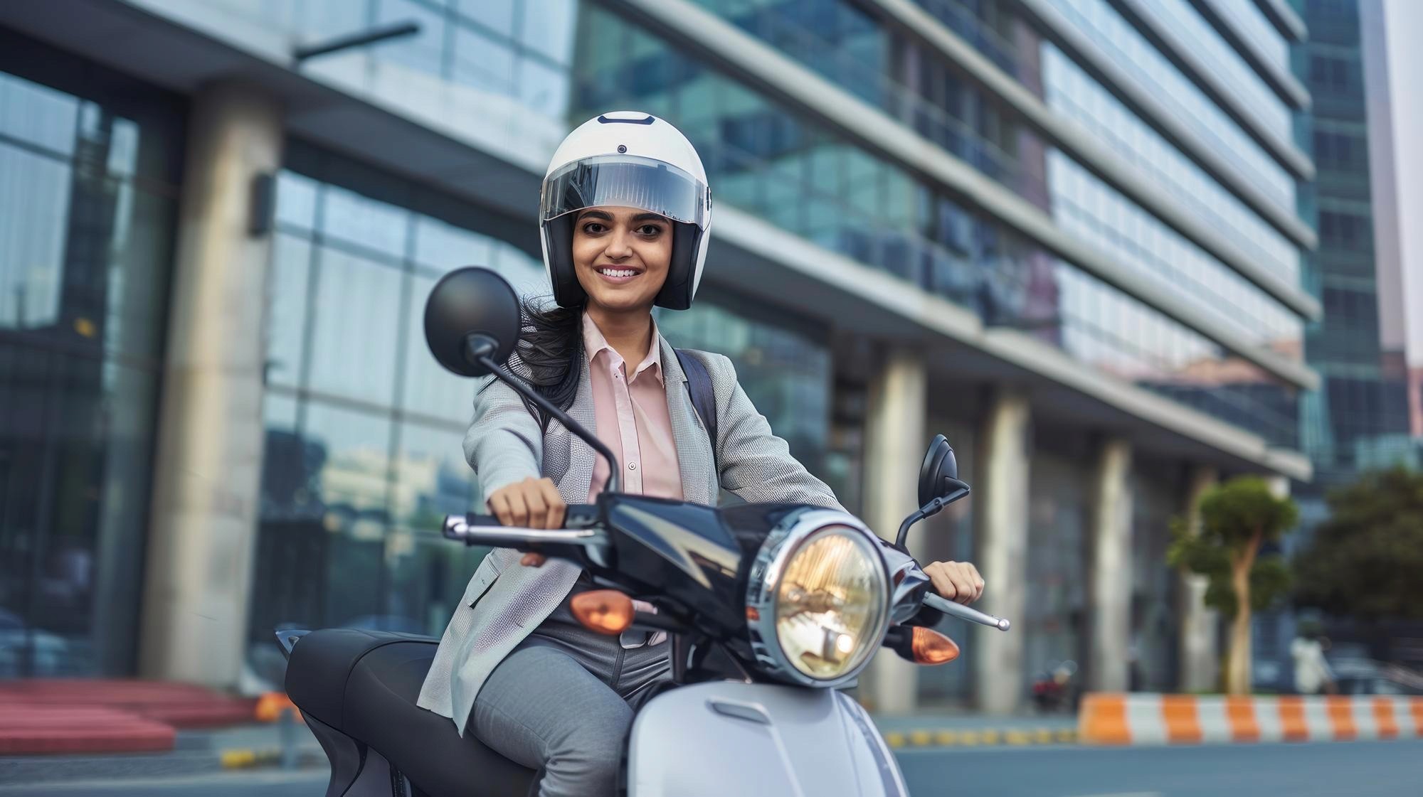 a person riding a EV Scooter