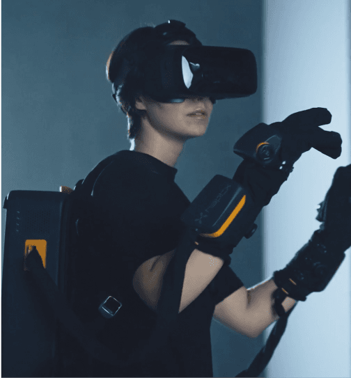 Model wearing Haptx technology during a commercial being shot at Particle Studio in Seattle