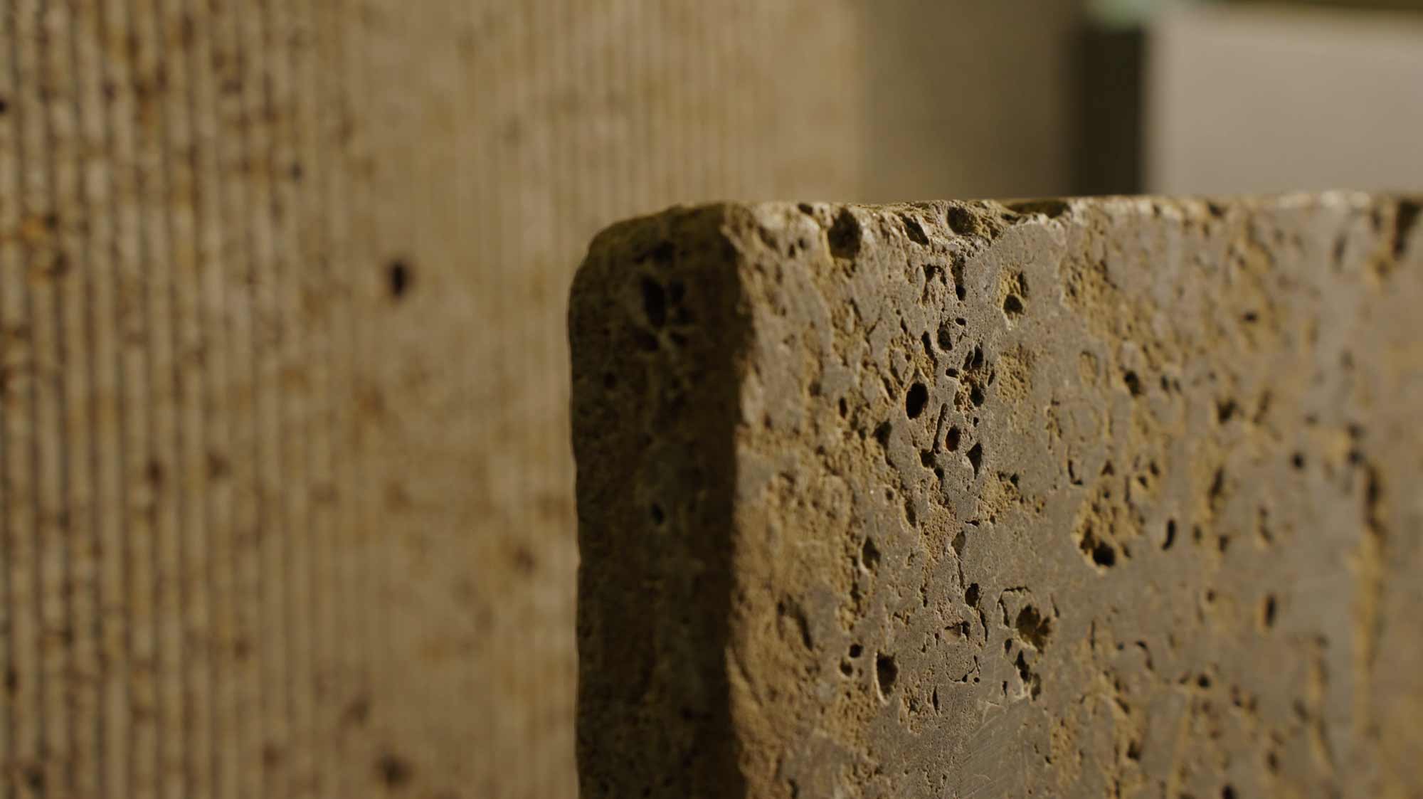 Close-up of textured stone, ideal for strategic film production, storytelling, and social media campaign photography.