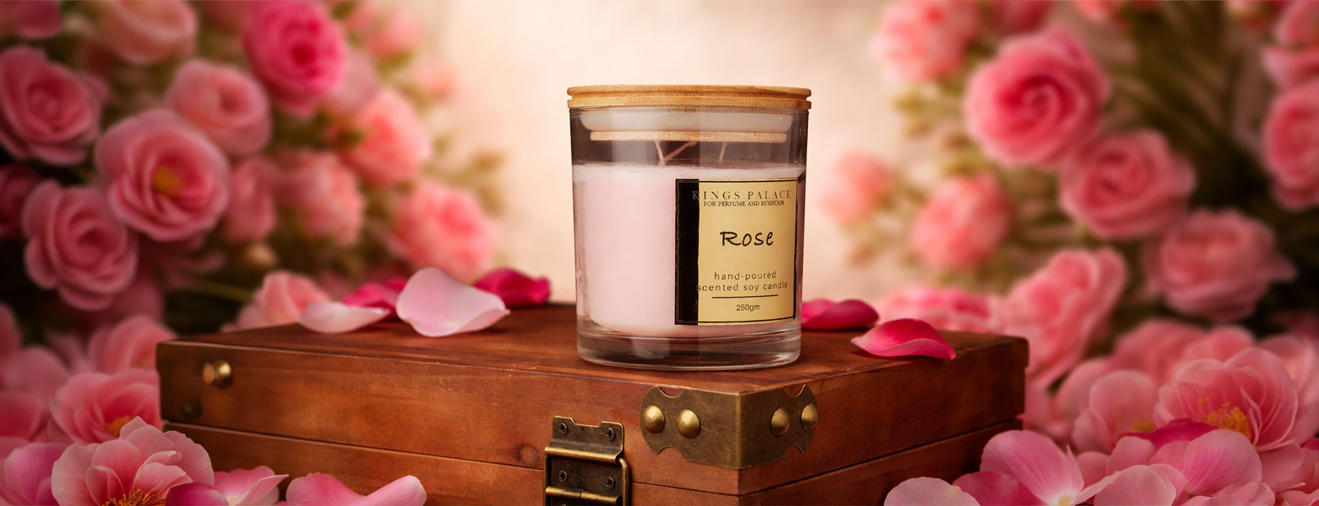 a bouquet of flowers sitting next to a bottle of perfume