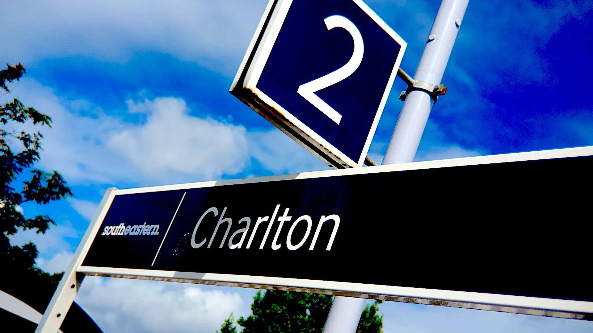 From platform 2 at Charlton station Southeastern mainline rail services provide regular direct trains to Woolwich Arsenal for Creative Kin video podcast studio London.