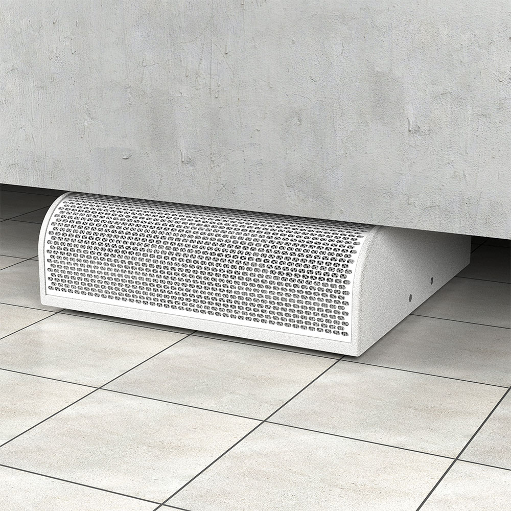 White radiator cover with perforated grill on tiled floor