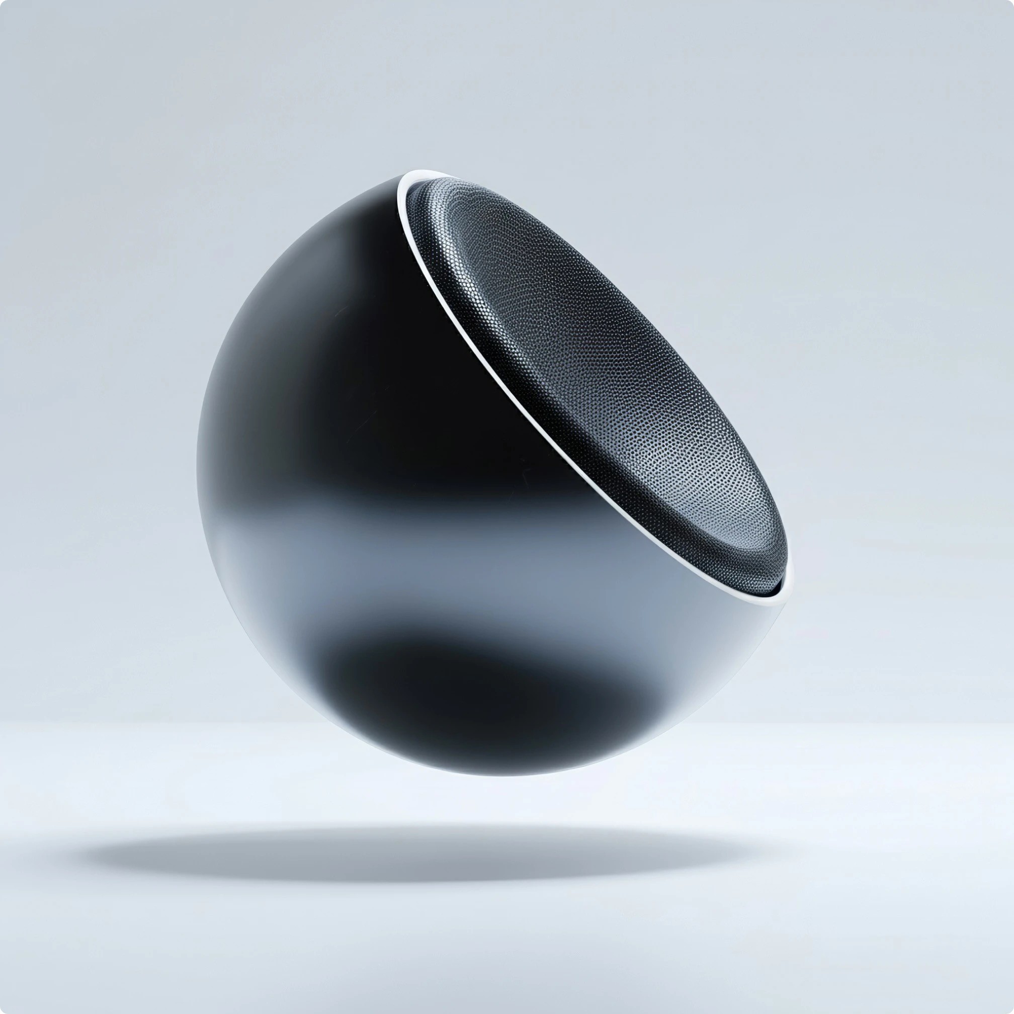 Modern table lamp with a black base and white shade casting a warm glow on a neutral background.