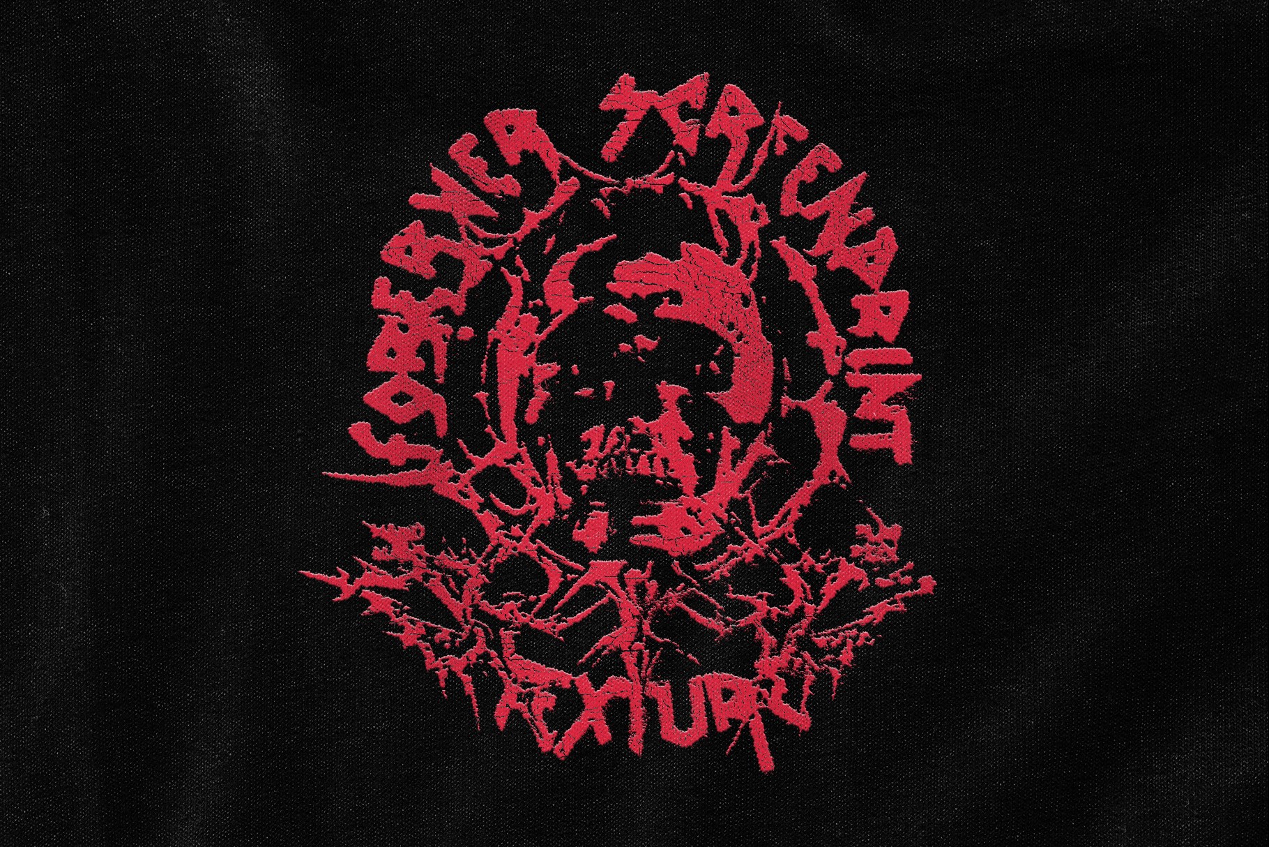 Vintage screen print design example using cracked plastisol ink texture on black fabric