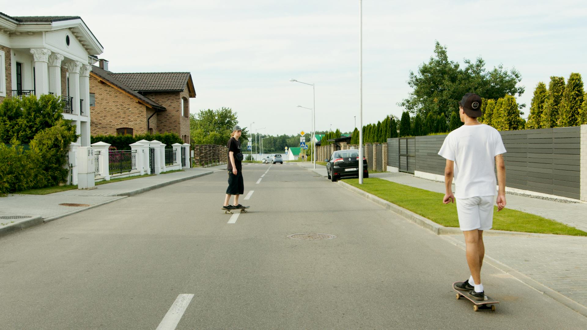 Teens Skateboarding on the street