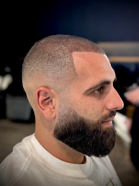 White male. hair enhancements. fade with beard grooming. west hollywood luxury barber courtney palmore. The rich barber hair studio