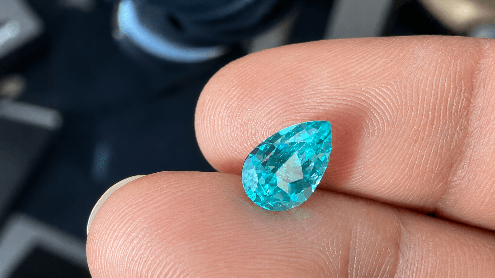 Paraiba-colour lab-grown sapphire in electric neon blue and mint teal, the honest alternative to lab-grown Paraiba tourmaline