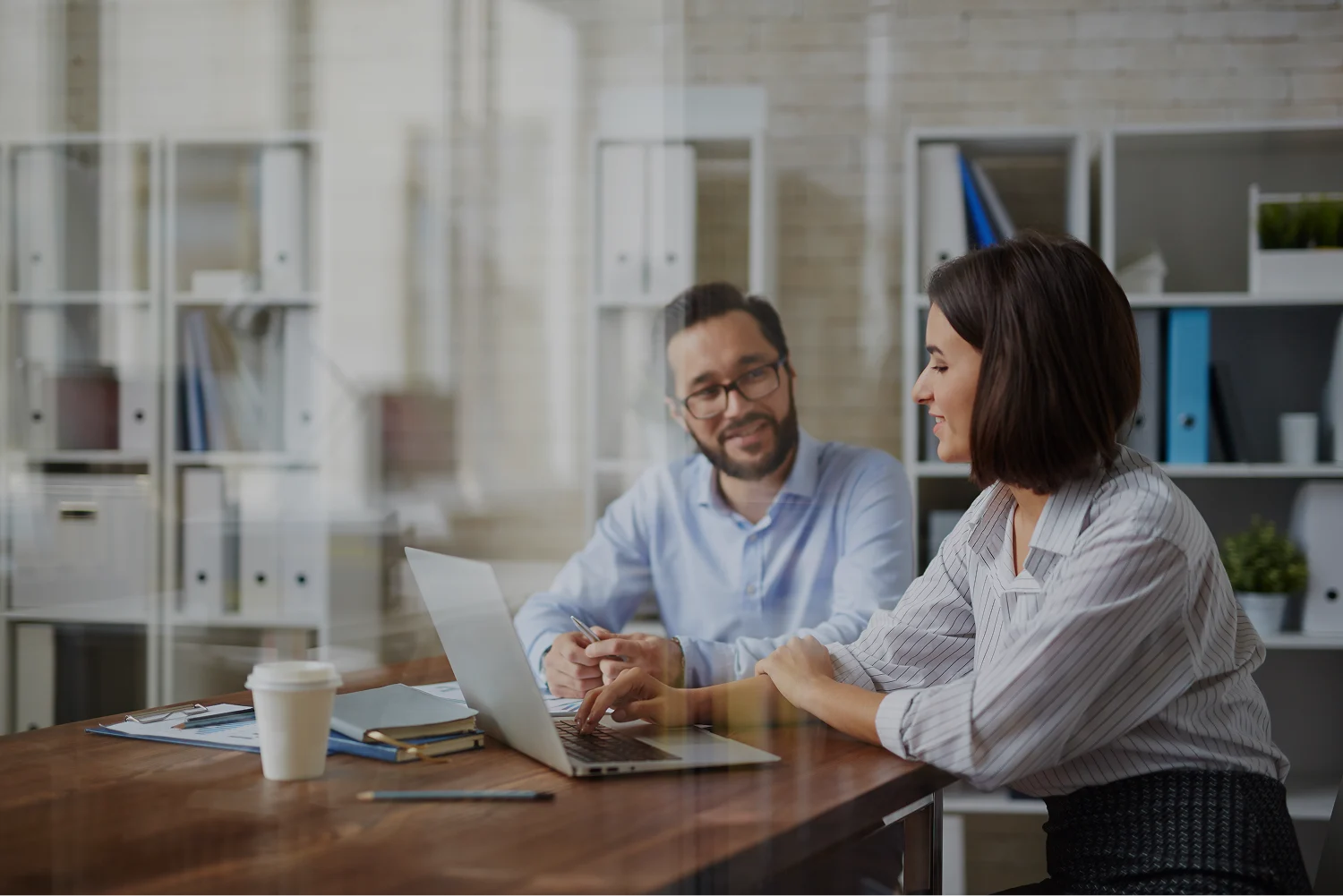 A man and a woman working together