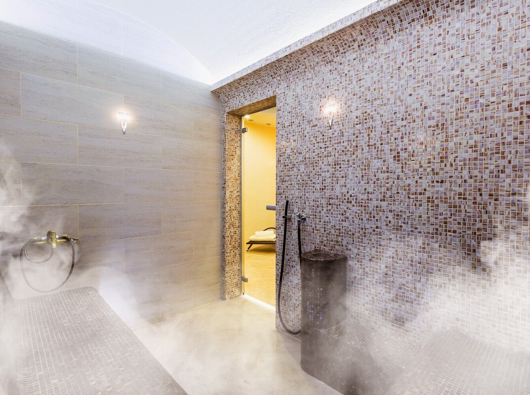 empty modern steam room for weight loss at a gym