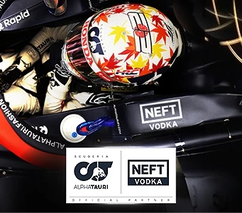 NEFT Vodka and AlphaTauri logos on a sponsored F1 car.