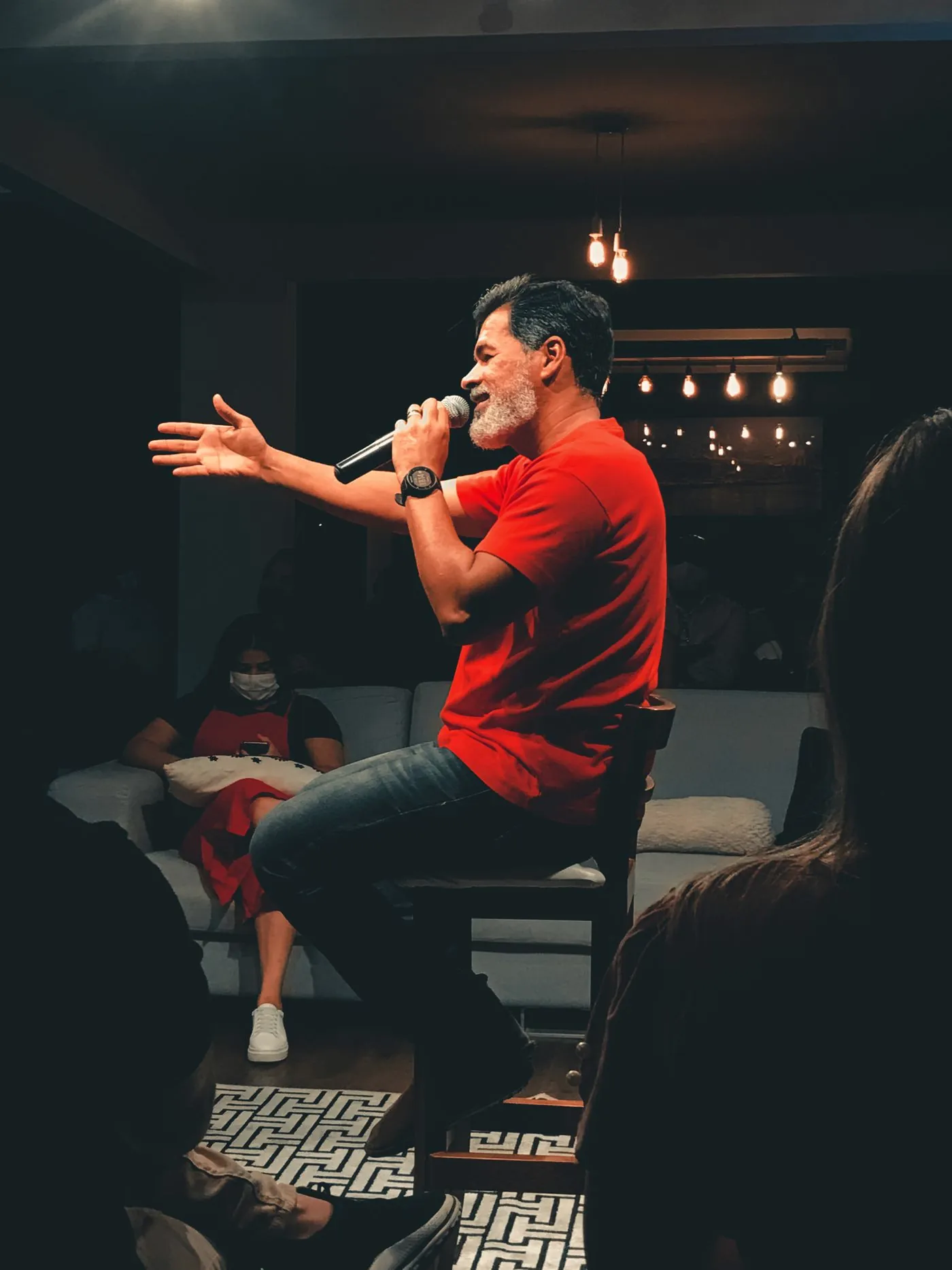 Mateo Vargas speaking on stage at Confluence Church