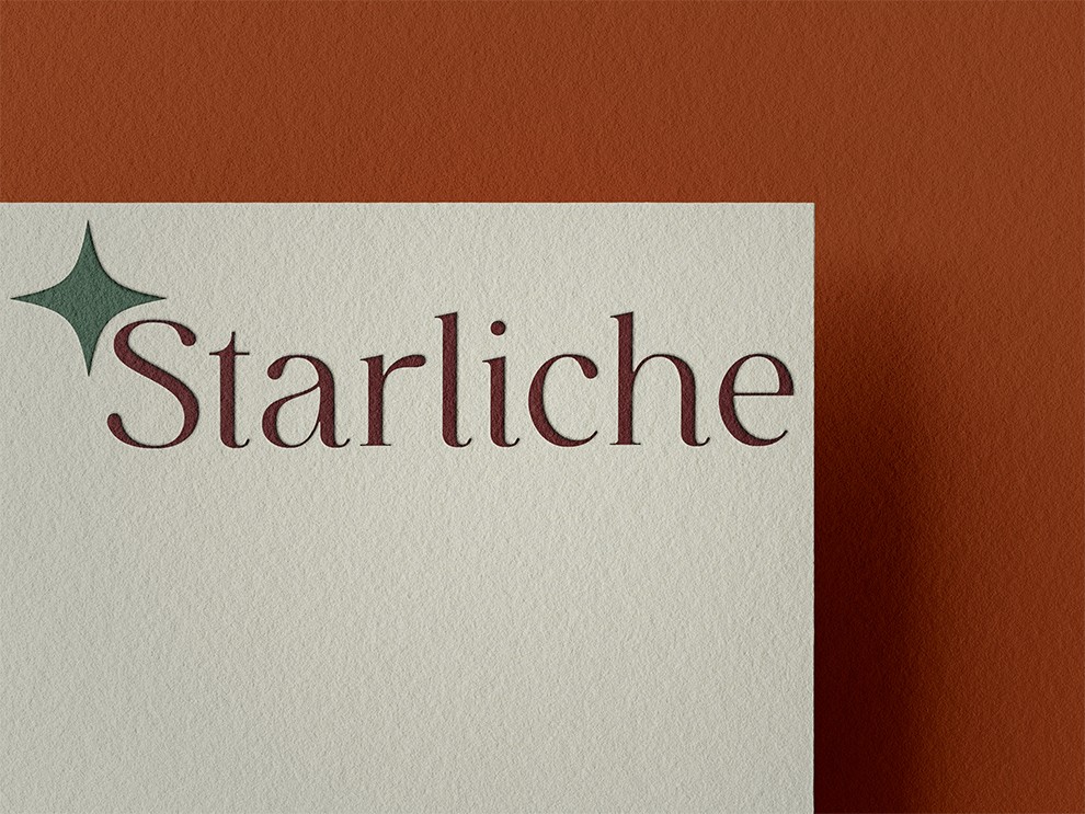 Bespoke logo design and elegant visual identity mockup for Starliche featuring a classic star symbol and custom serif typography on textured cream paper against a terracotta background.