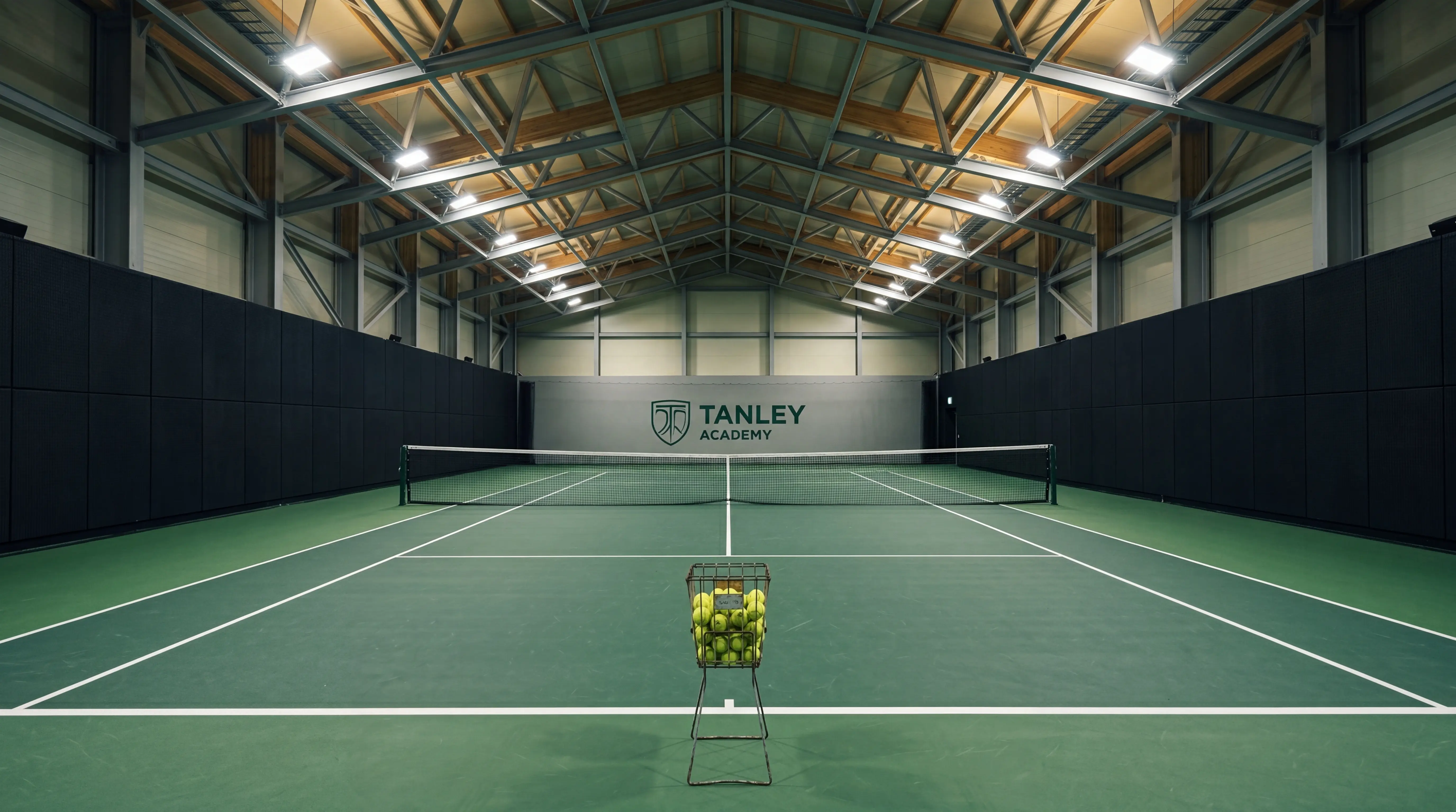 Photo of an sports academy indoor tennis court