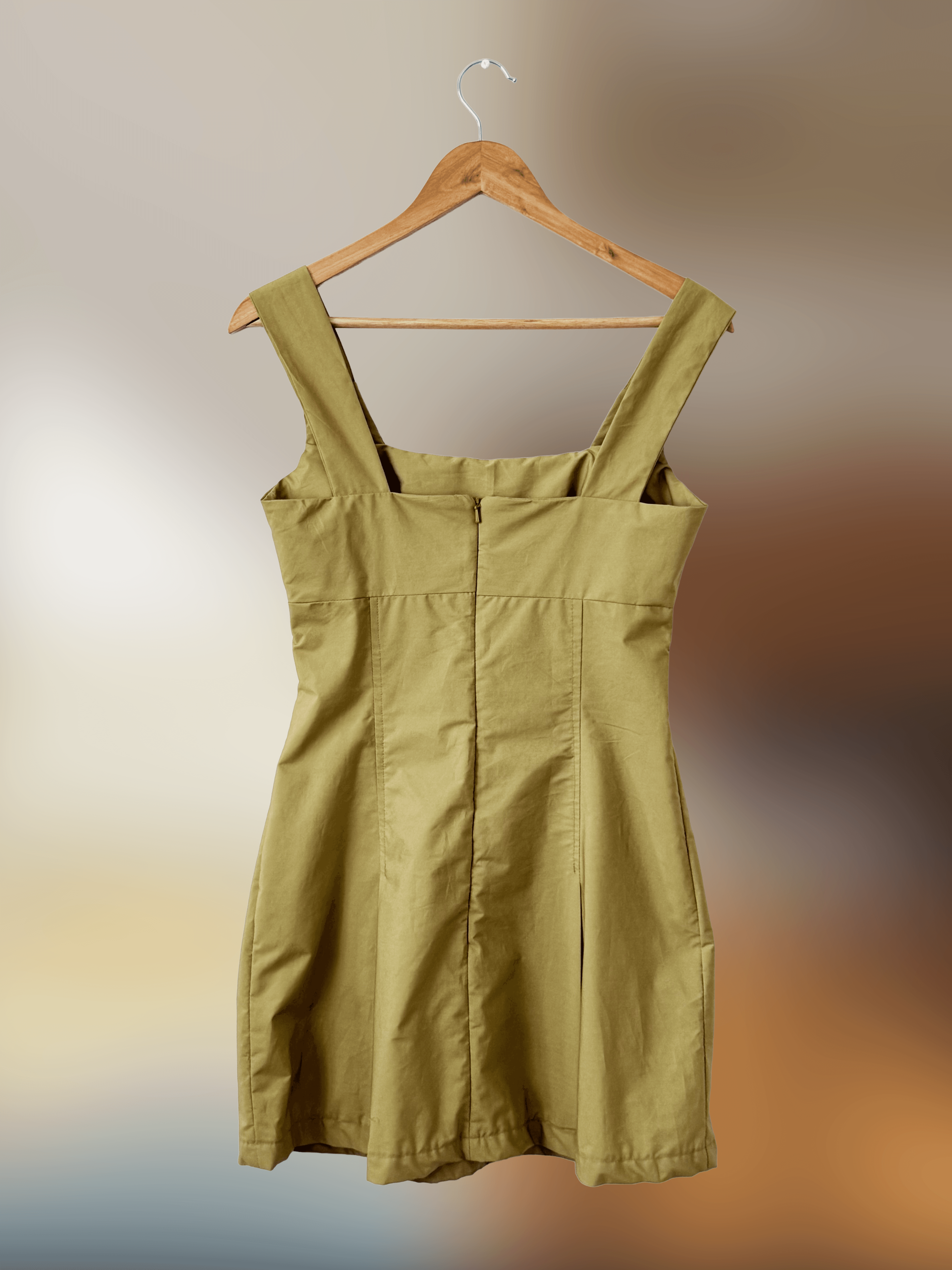 back of muted green mini dress with thick straps and back invisible zipper