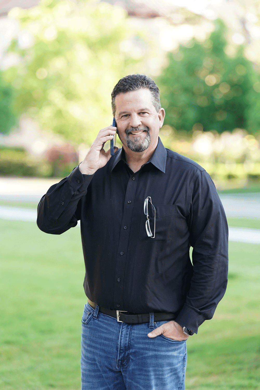 a woman in a white jacket and striped pants