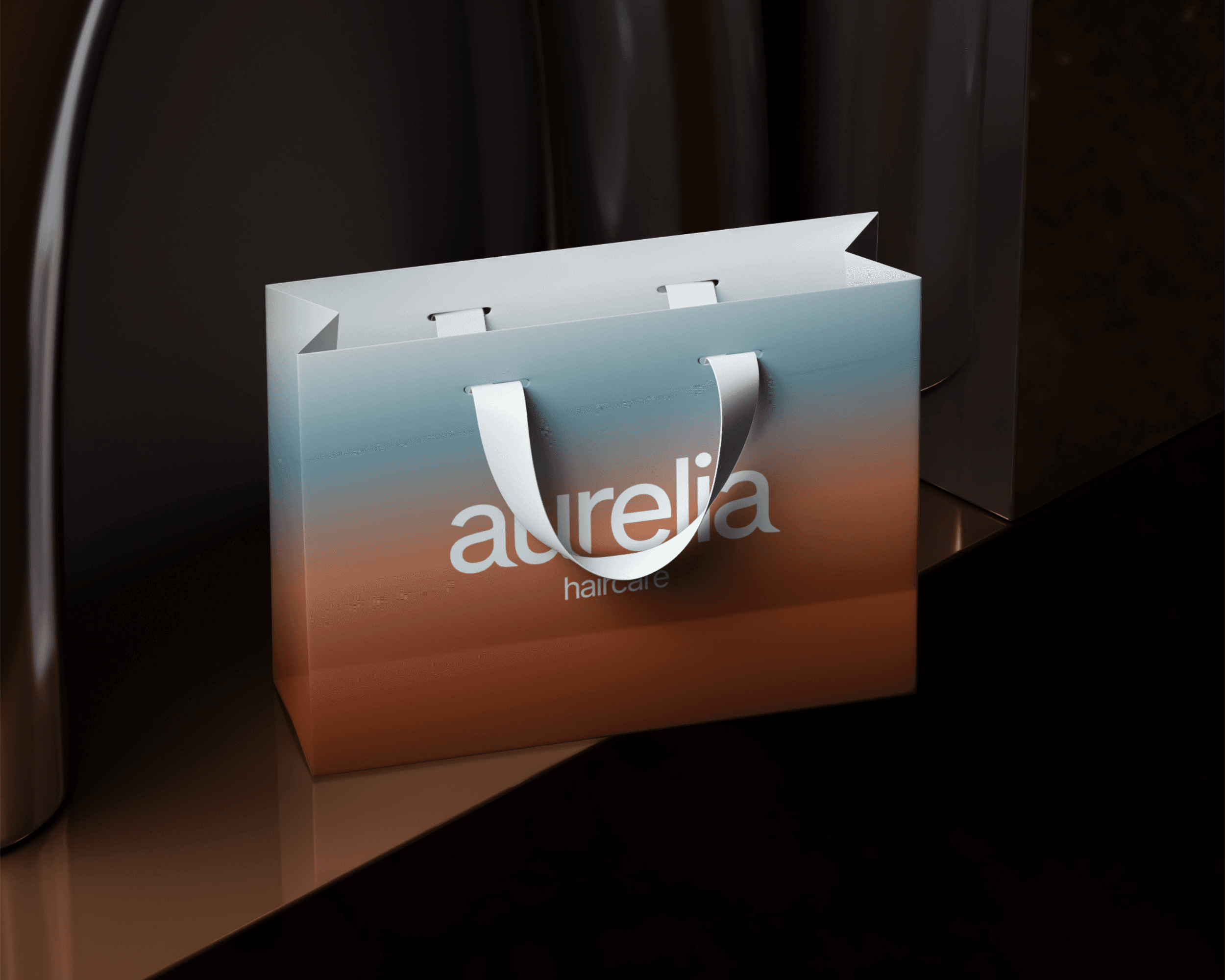 An Aurelia Haircare shopping bag, which features a blue and brown gradient with the brand logo in the center of the bag.