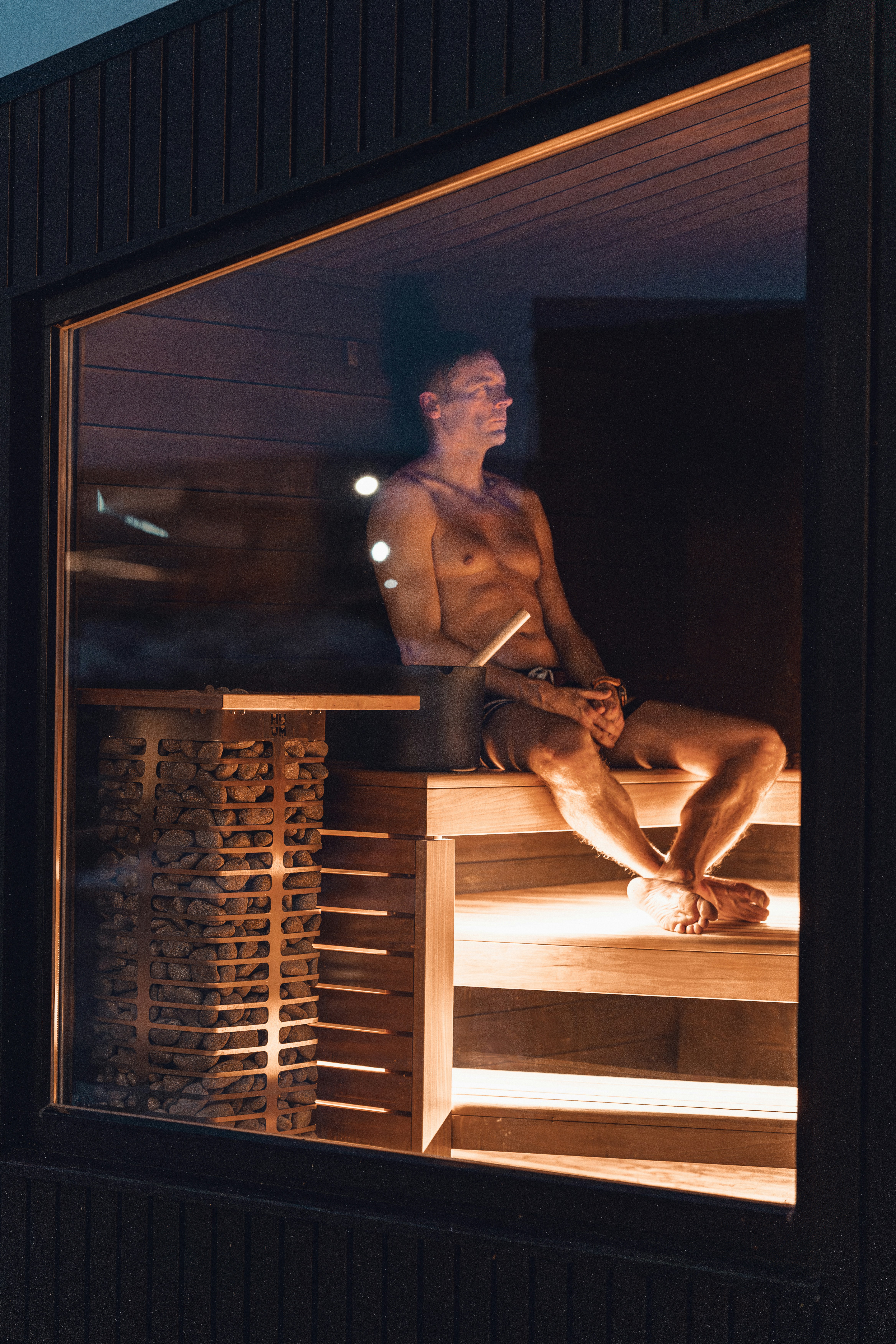 A man relaxing in a sauna