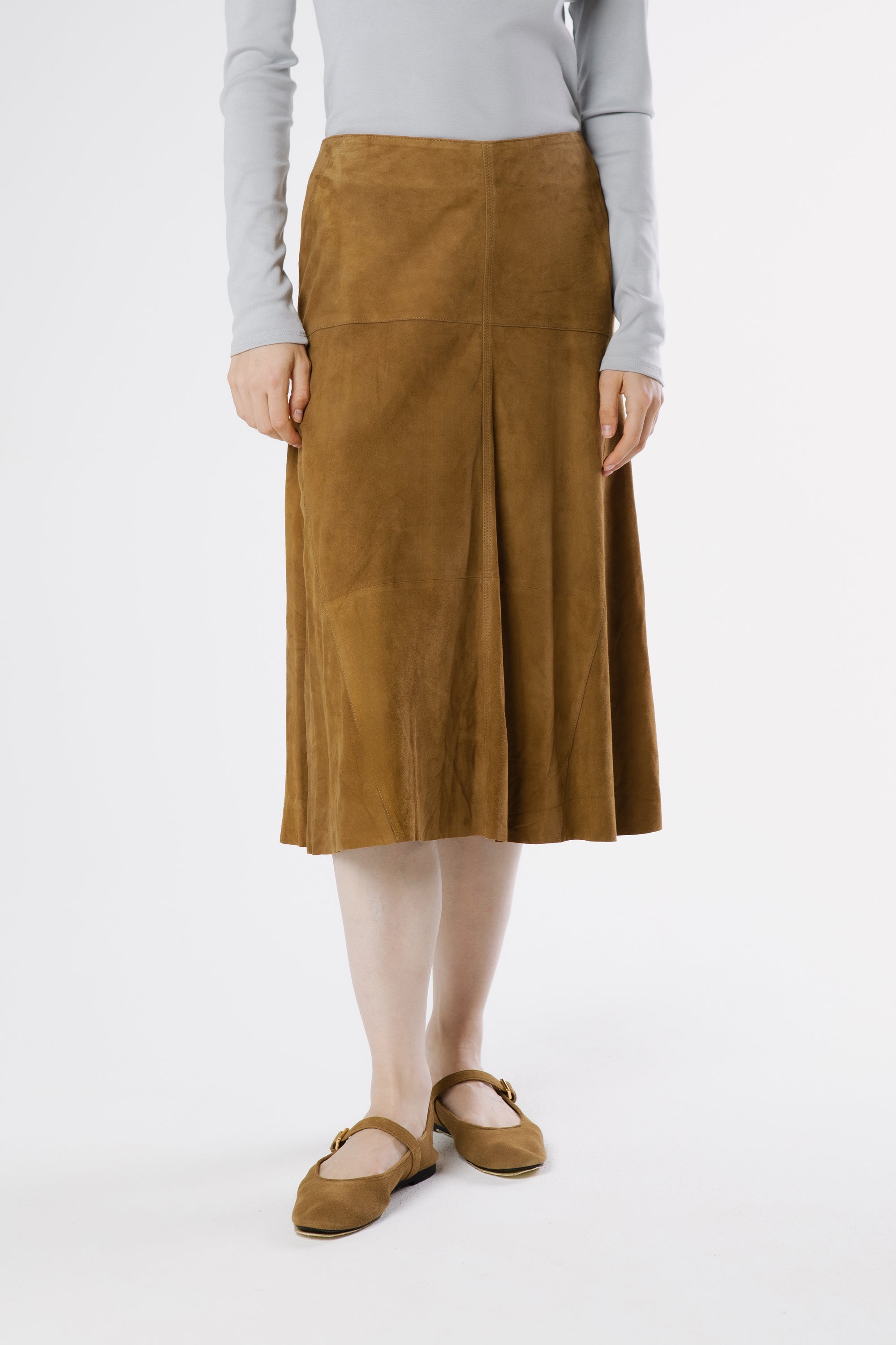 Front view of Milano suede midi skirt in oak tone with soft flared silhouette and panel detailing