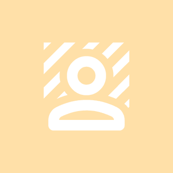 Professional headshot of a person in a formal setting.