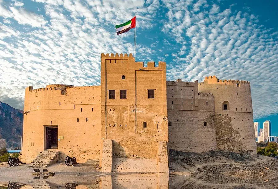 white umbrella on seashore