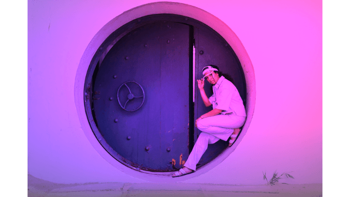 woman standing infront of a vault (Photo by Mikhail Nilov)