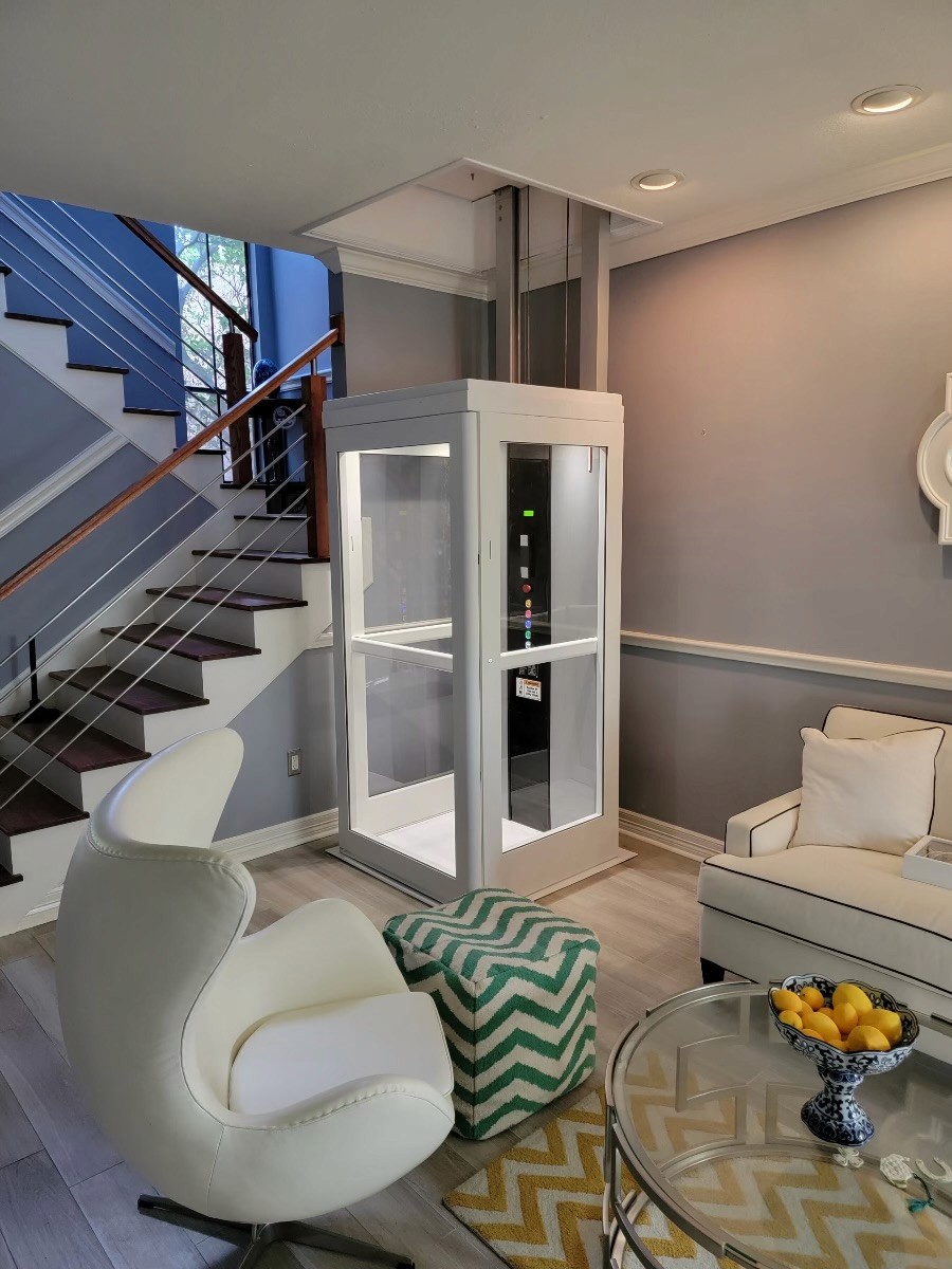 Through-the-floor home elevator installation