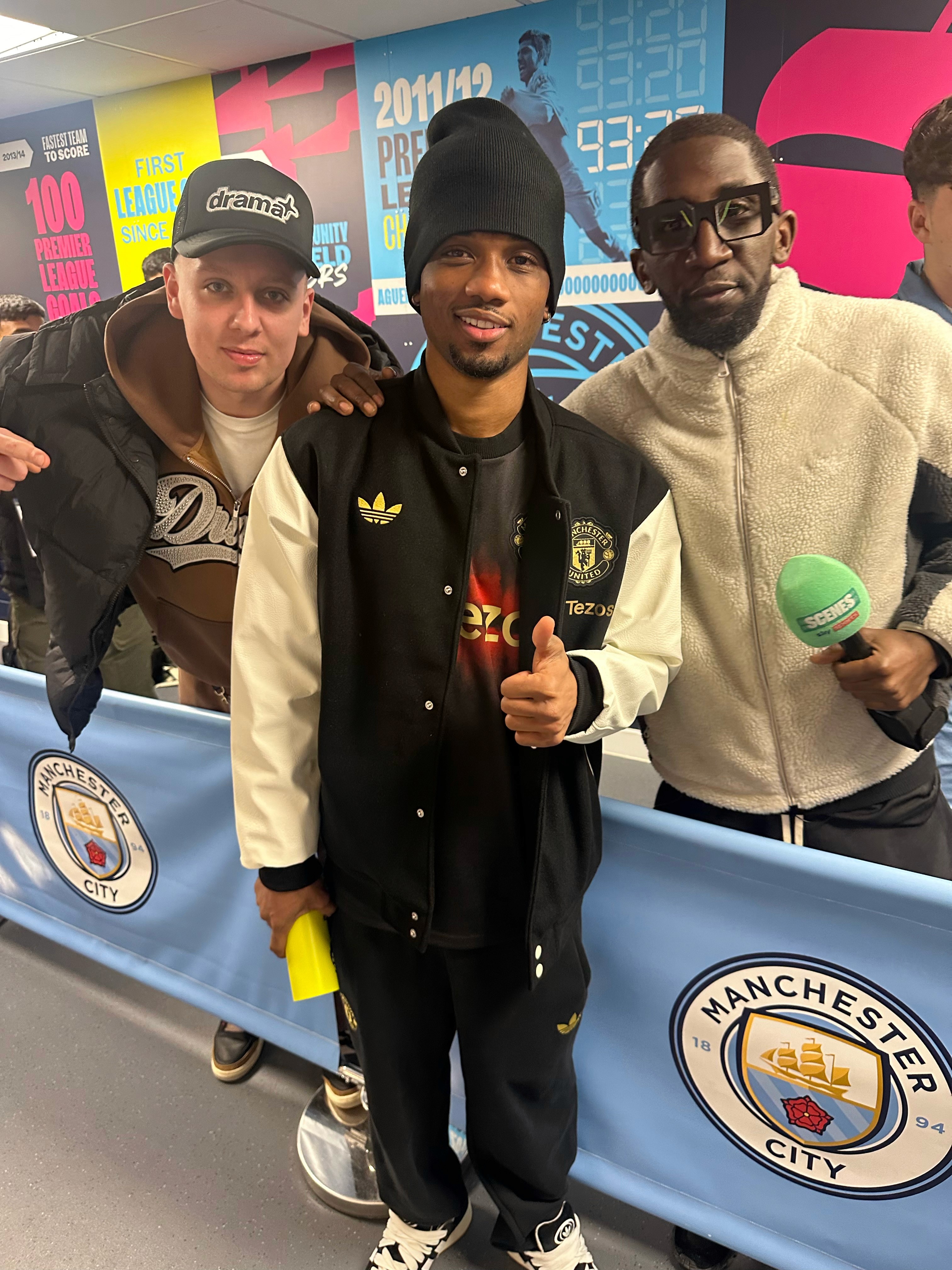 Specs, Aitch, and Amad Diallo at the Manchester Derby