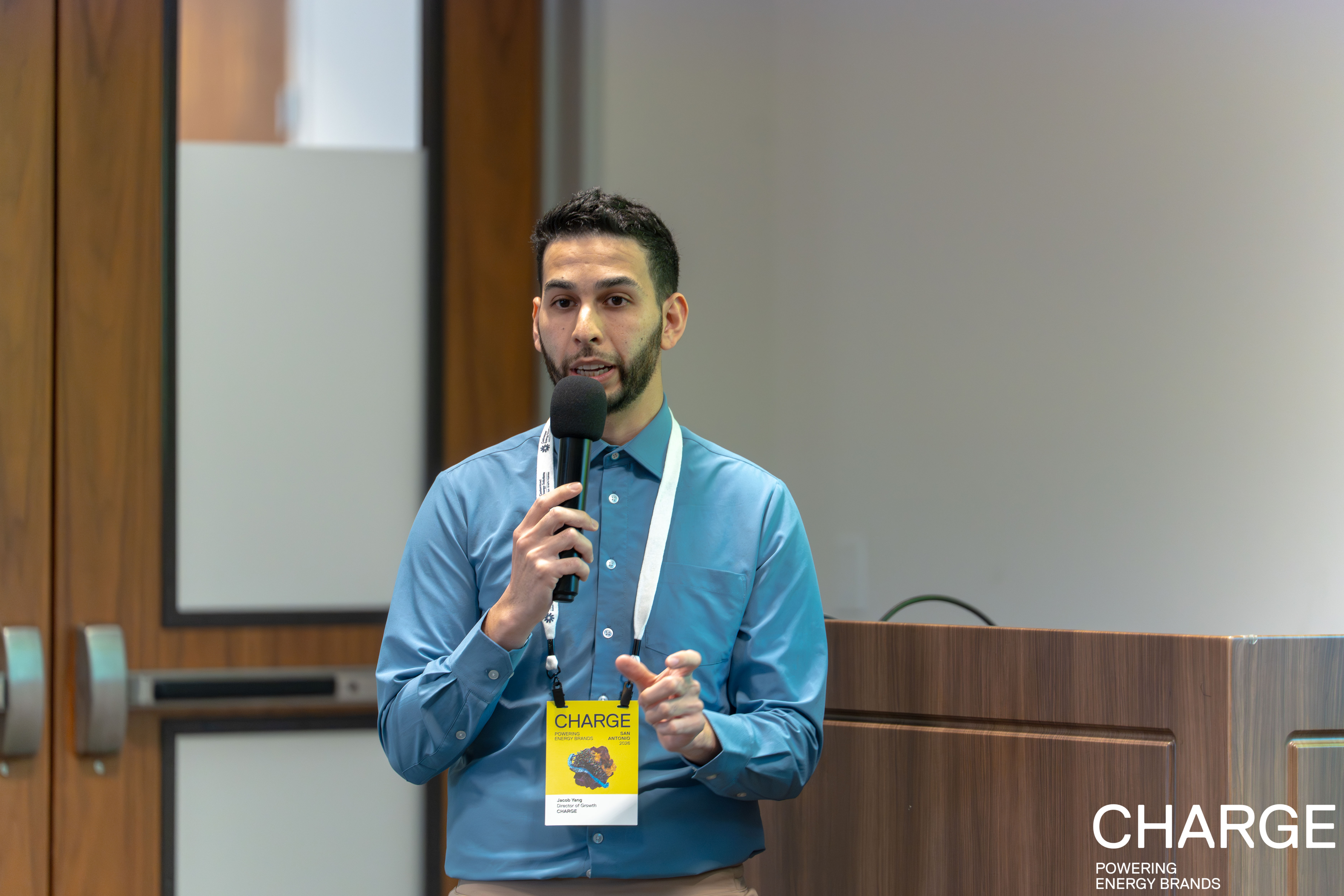 Jacob Yang speaking at a conference