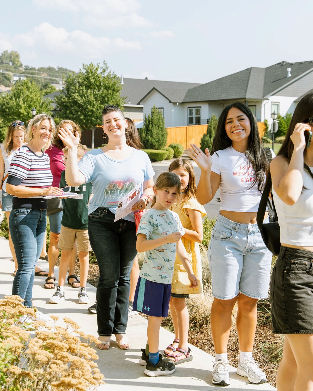 Community wellness event at Alma Collective with participants arriving
