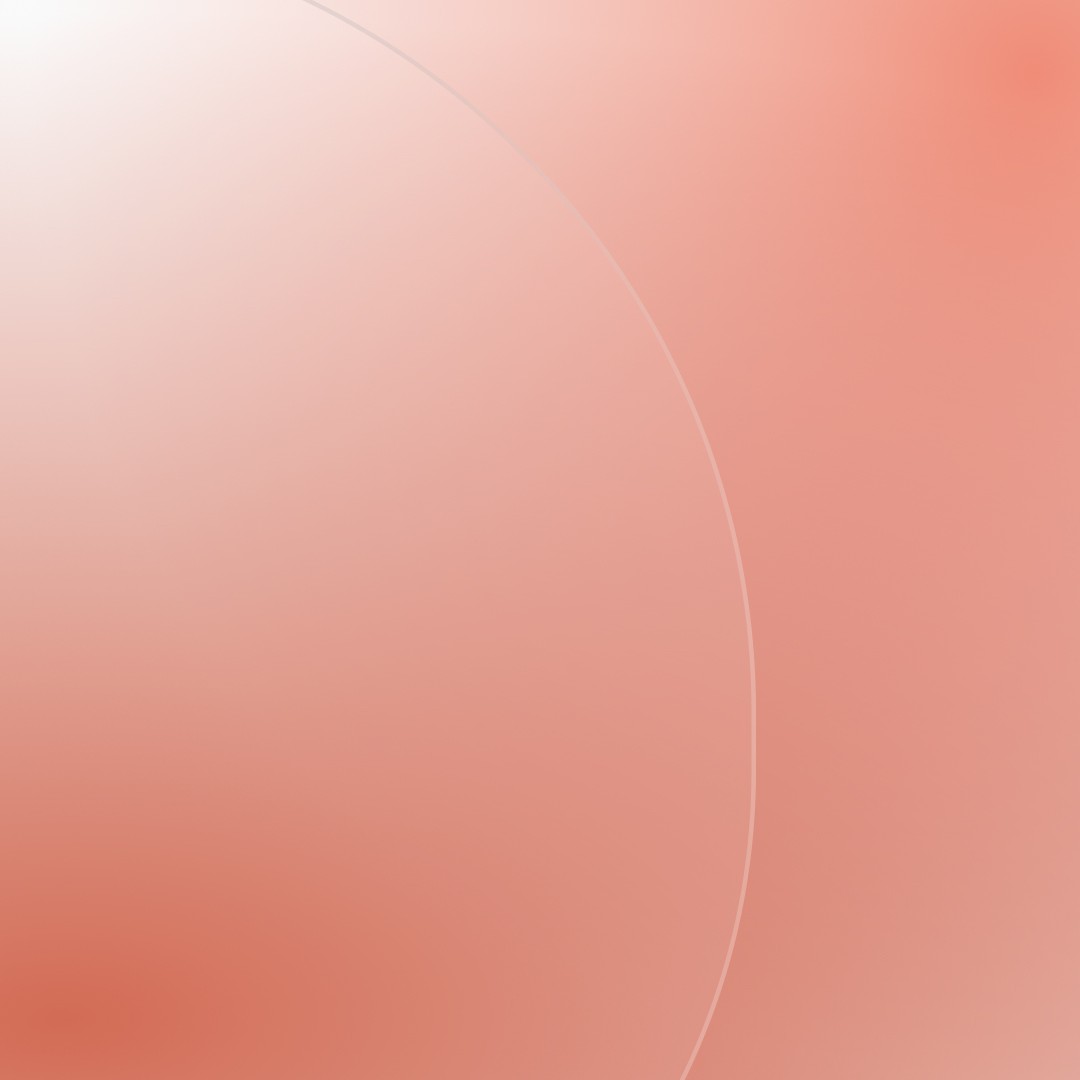 Mountain landscape with a calm lake, rocky shoreline, and pine trees reflecting in the water.