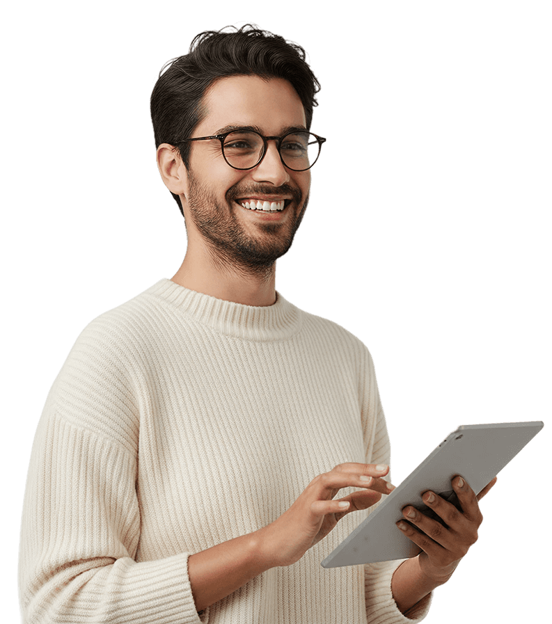 Smiling man in glasses holding a tablet.