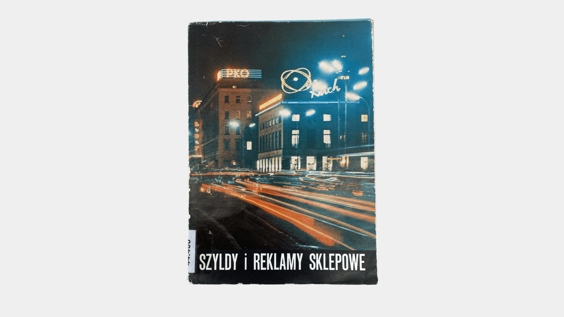 Okładka rzadkiej książki o projektowaniu szyldów i reklam sklepowych - najstarsza polska ksiązka o tej tematyce –&nbsp;Szyldoteka