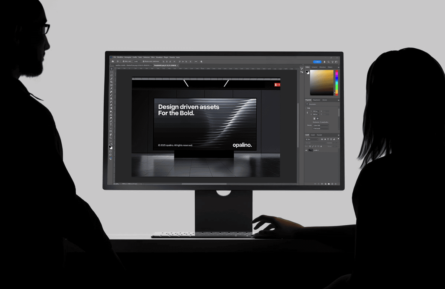 Four diverse professionals collaboratively working on a laptop, with one person pointing at the screen while others observe.