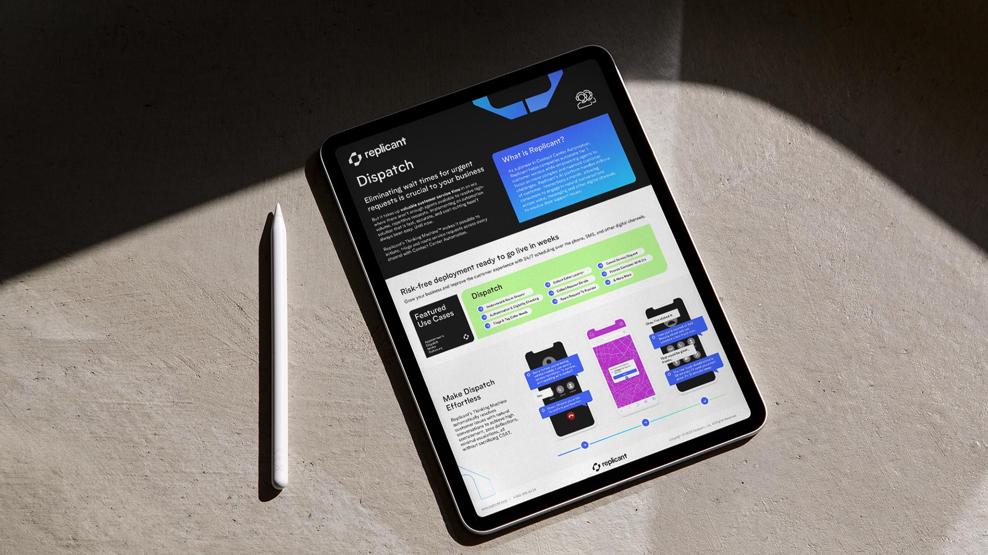 Angled iPad mockup displaying Replicant branded product and marketing interface designs on a textured concrete surface beside an Apple Pencil, lit with dramatic directional lighting.