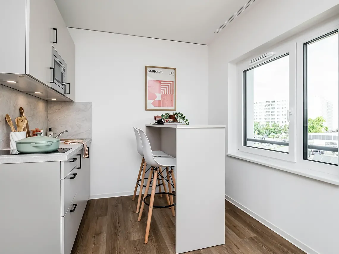 Private kitchenette and dining area in a student studio in Berlin