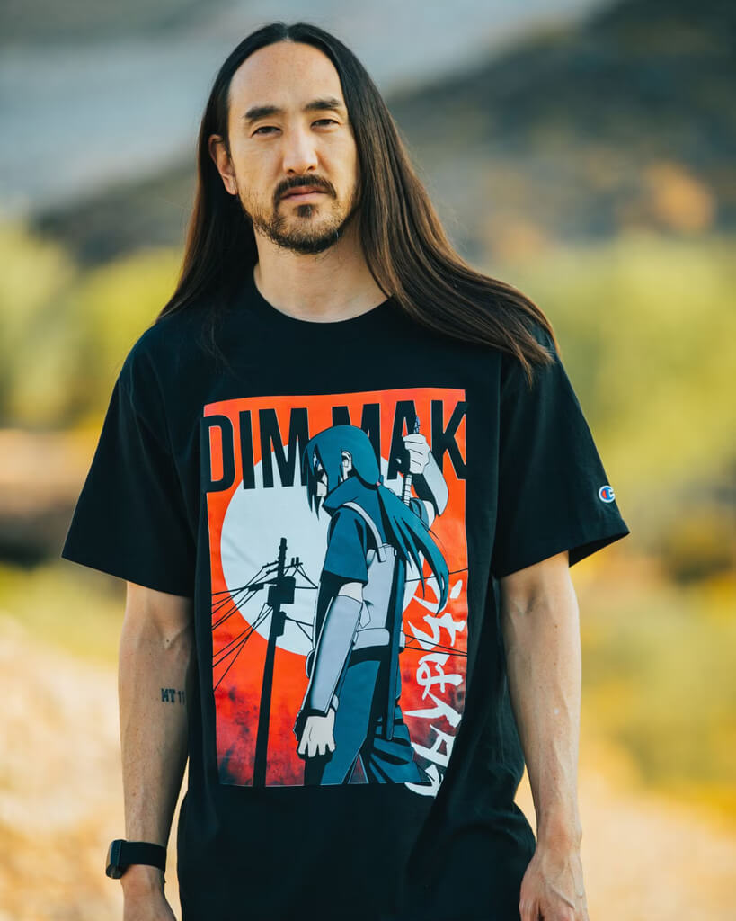 MrBeast, a young man with short hair wearing a black t-shirt, looking thoughtfully to the side against a gray background.