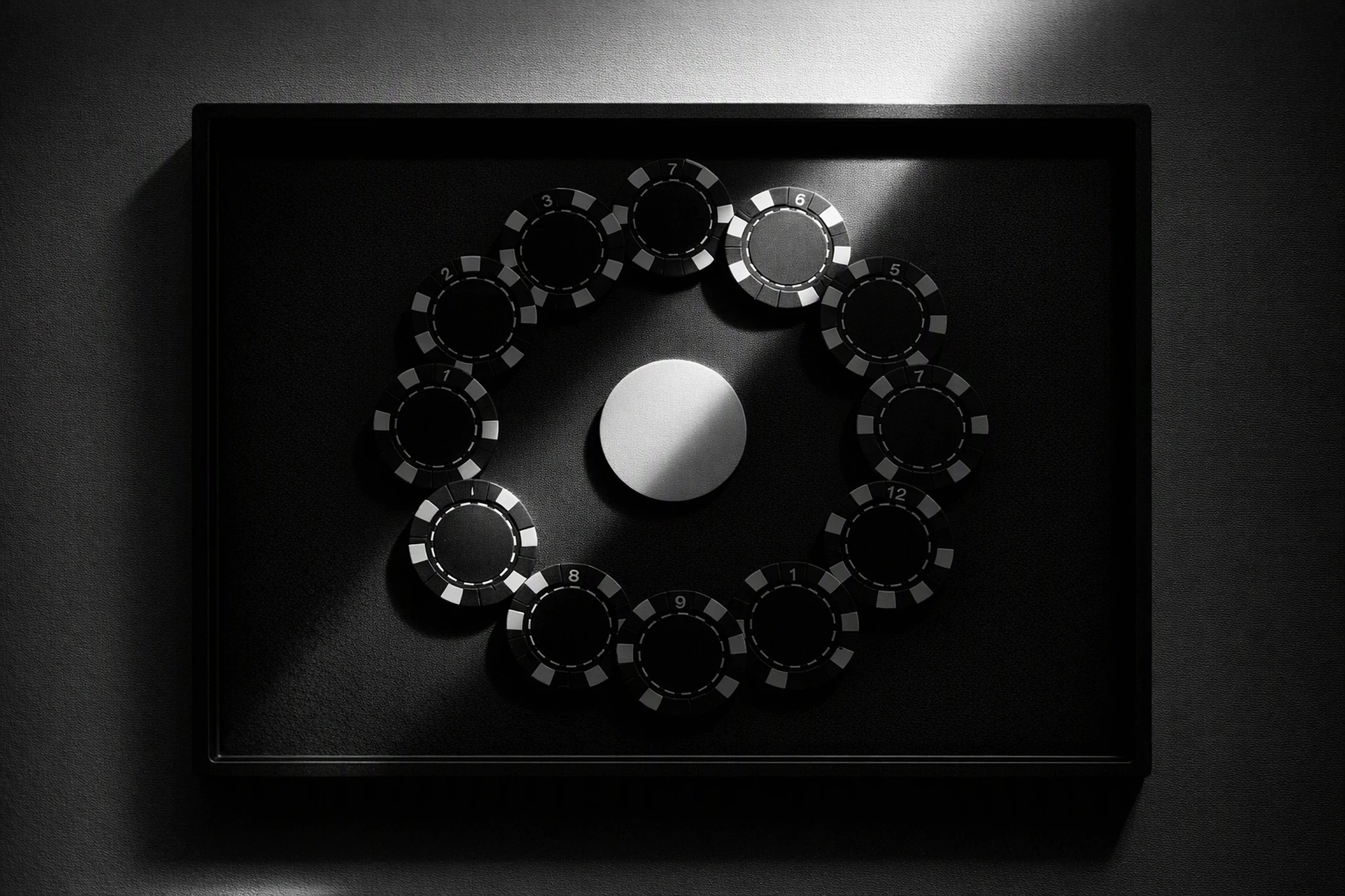Abstract black ink splatter on white background.
