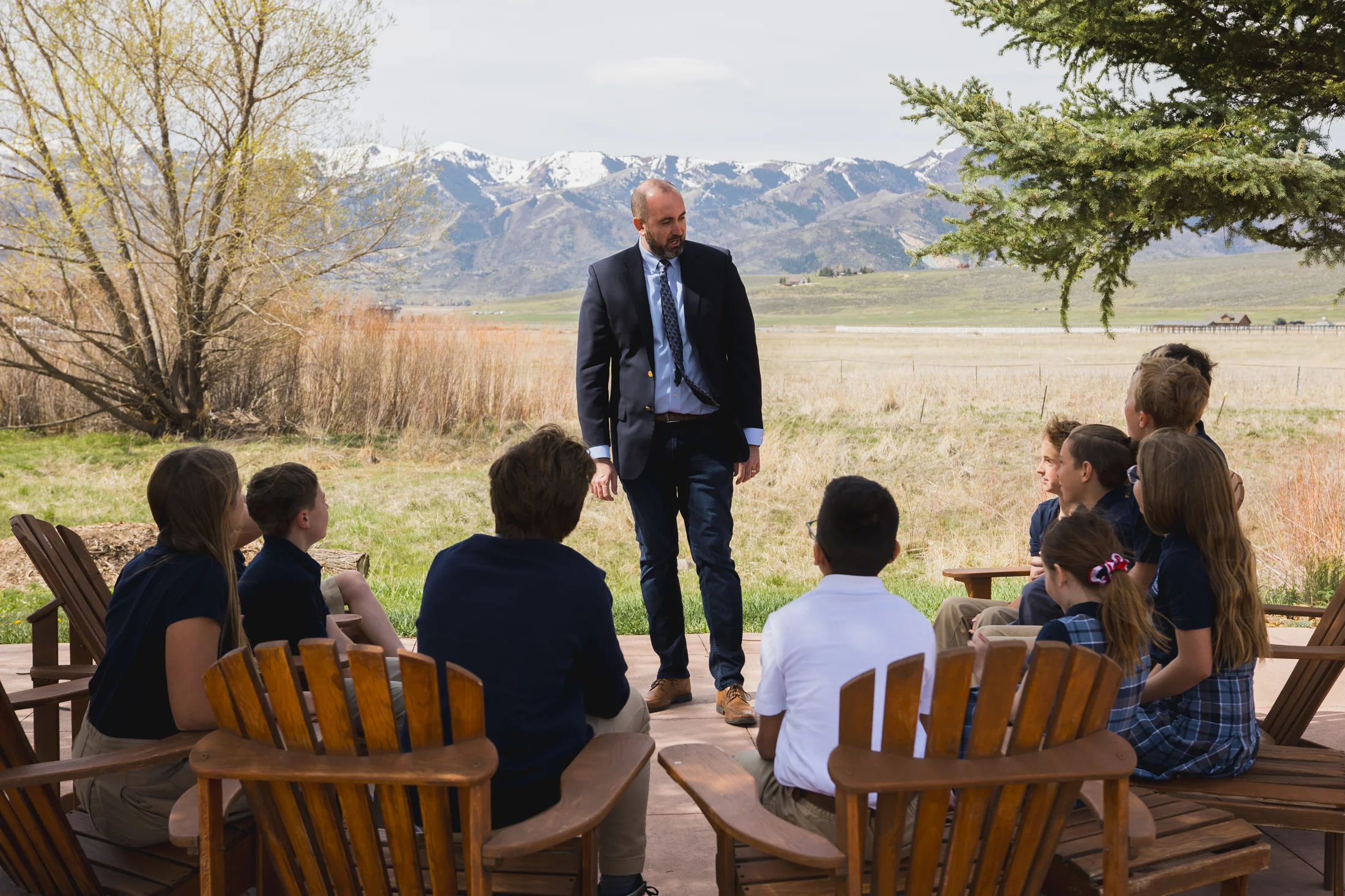 Teacher and students outside