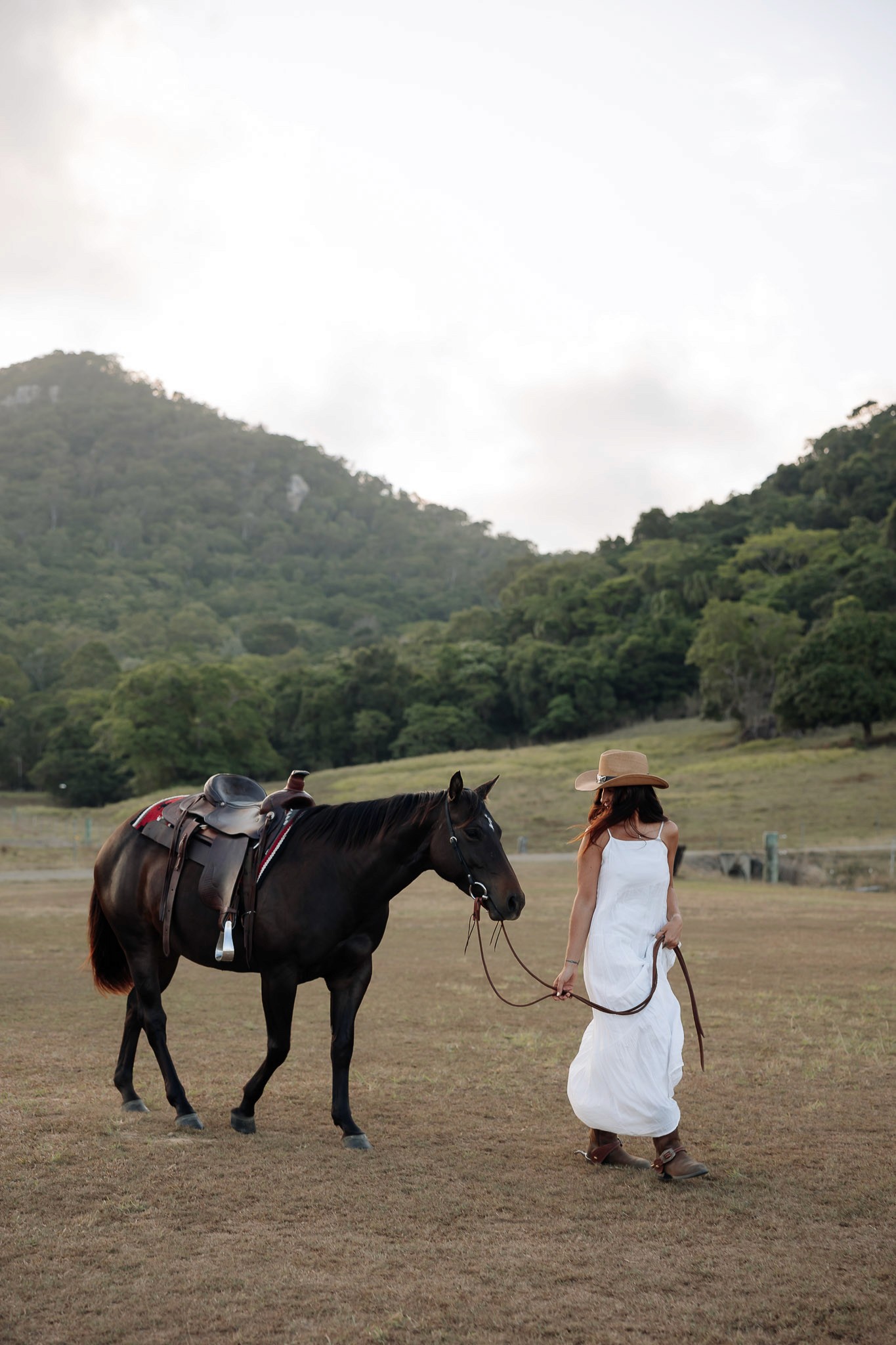 Photo of lady with horse in the country