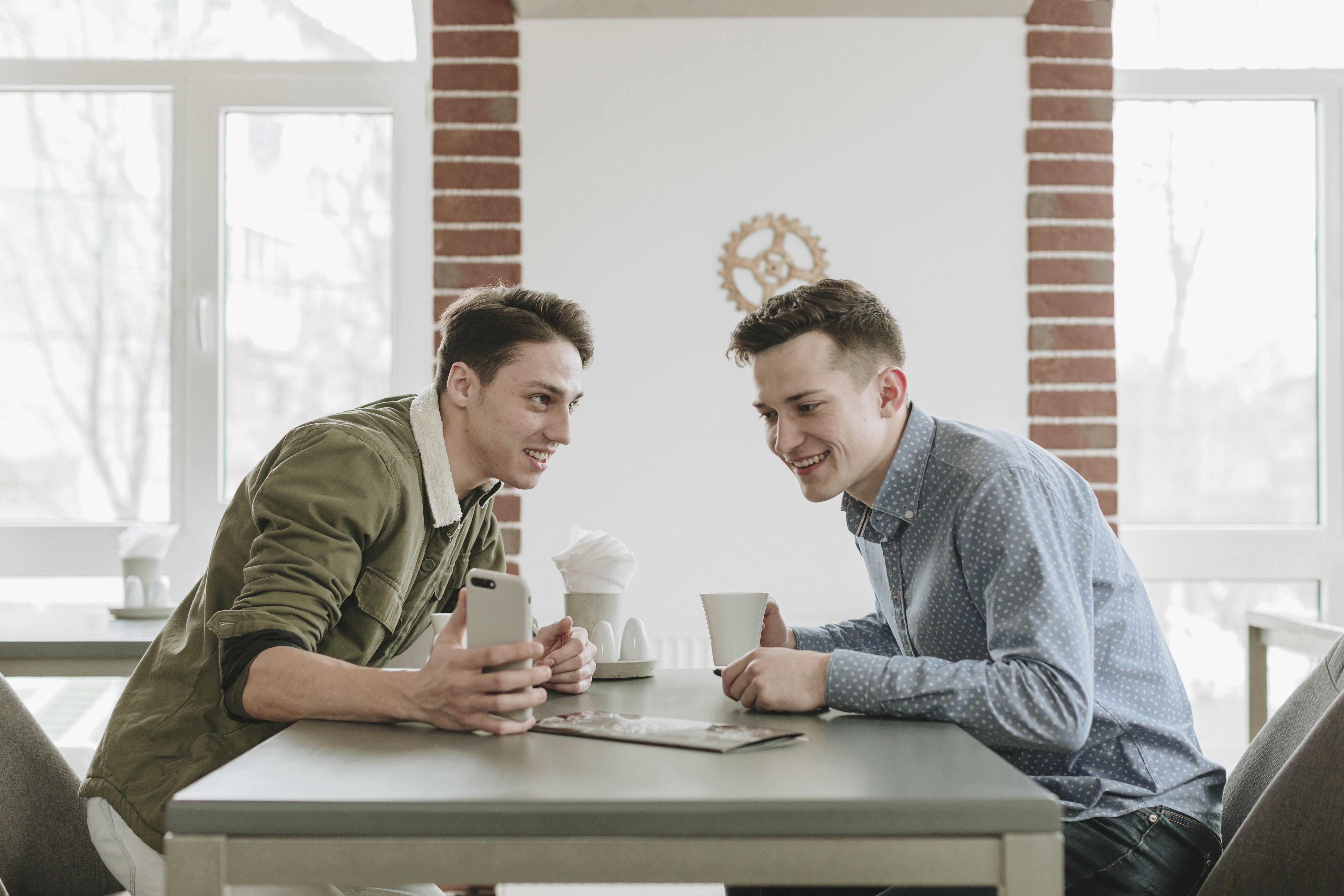 boys-having-coffee-restaurant