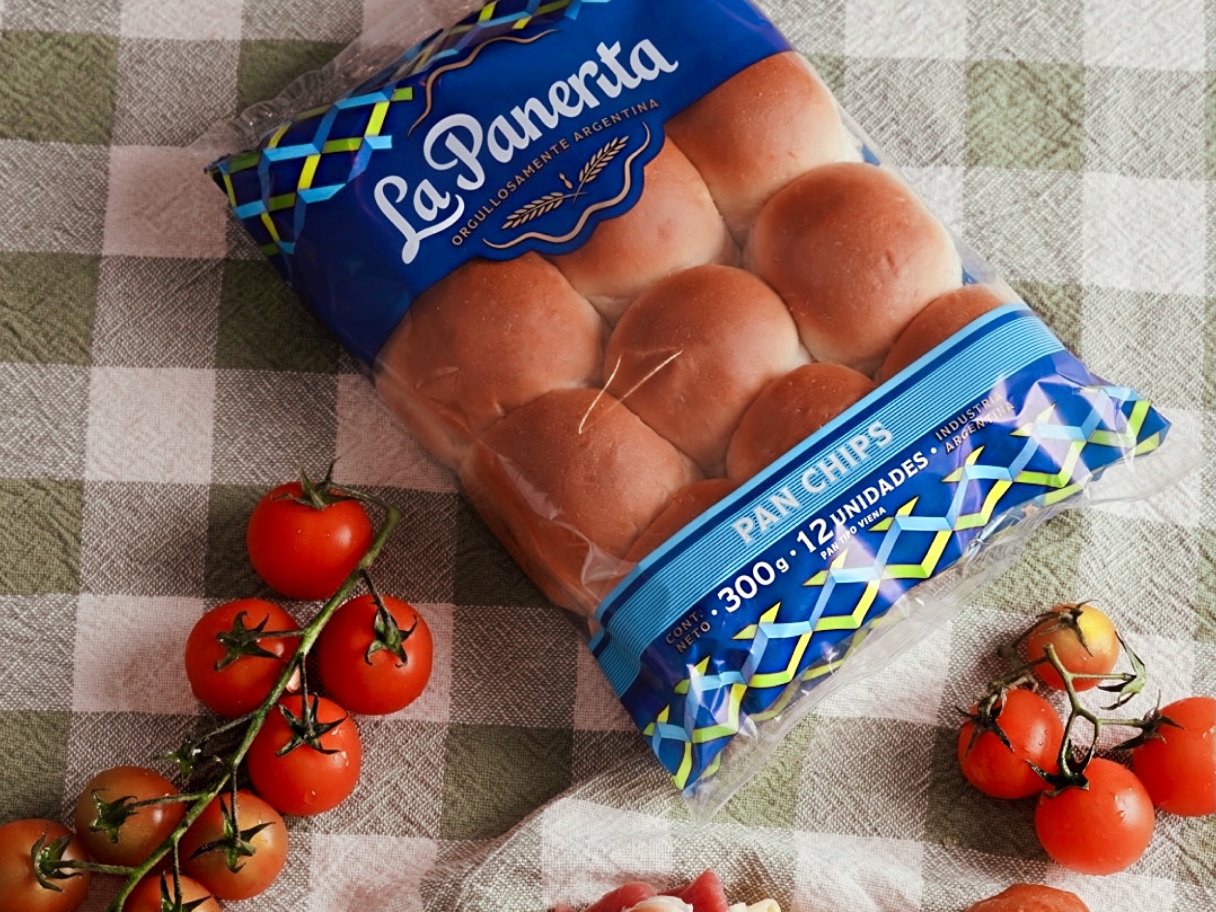 Rustic cabin in a golden field at sunset