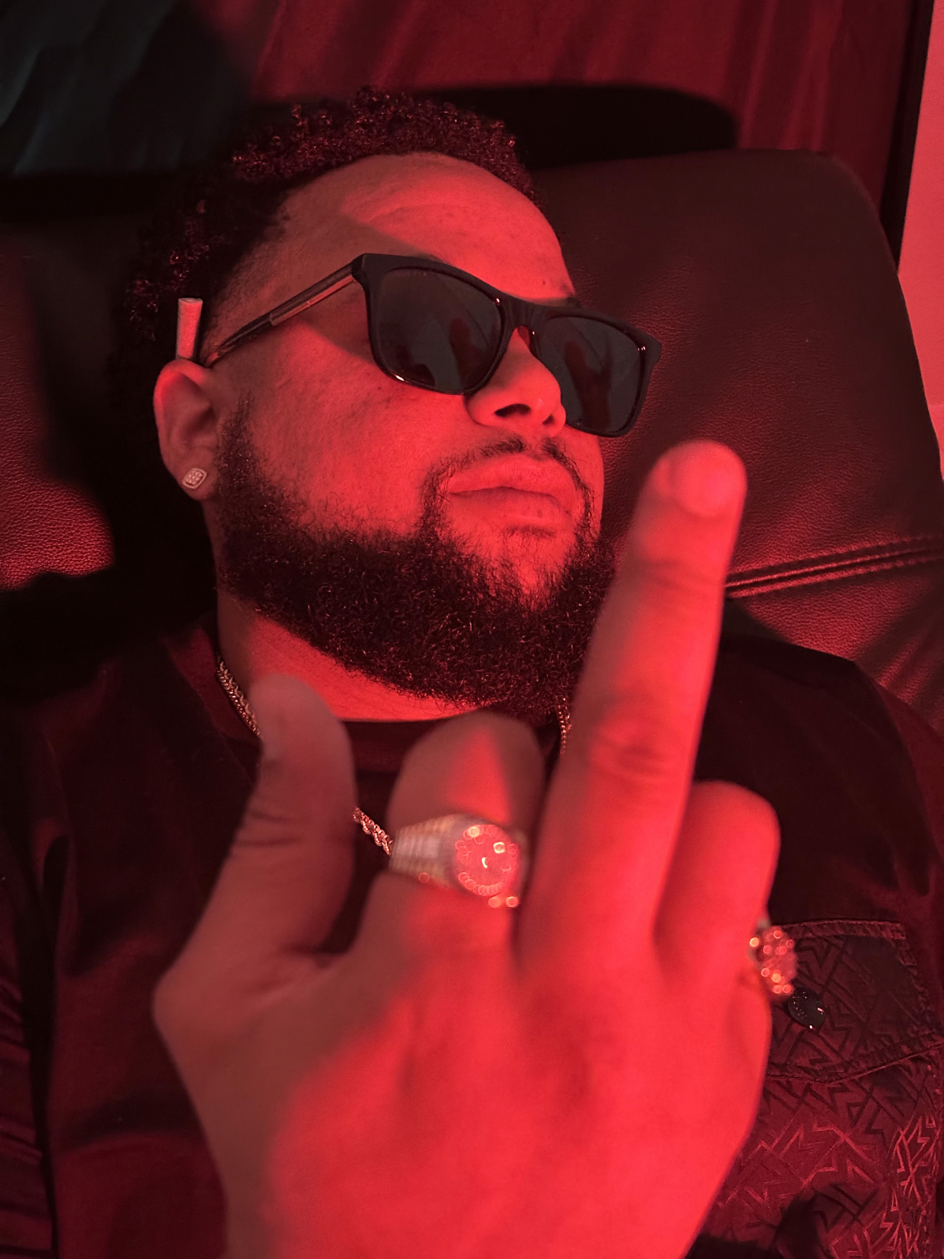 Guitarist performing on stage in silhouette