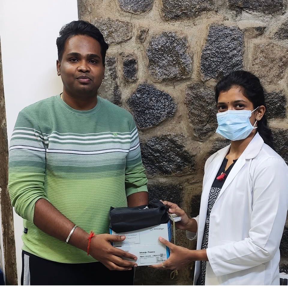 selective focus photography of smiling woman wearing red and black bandana