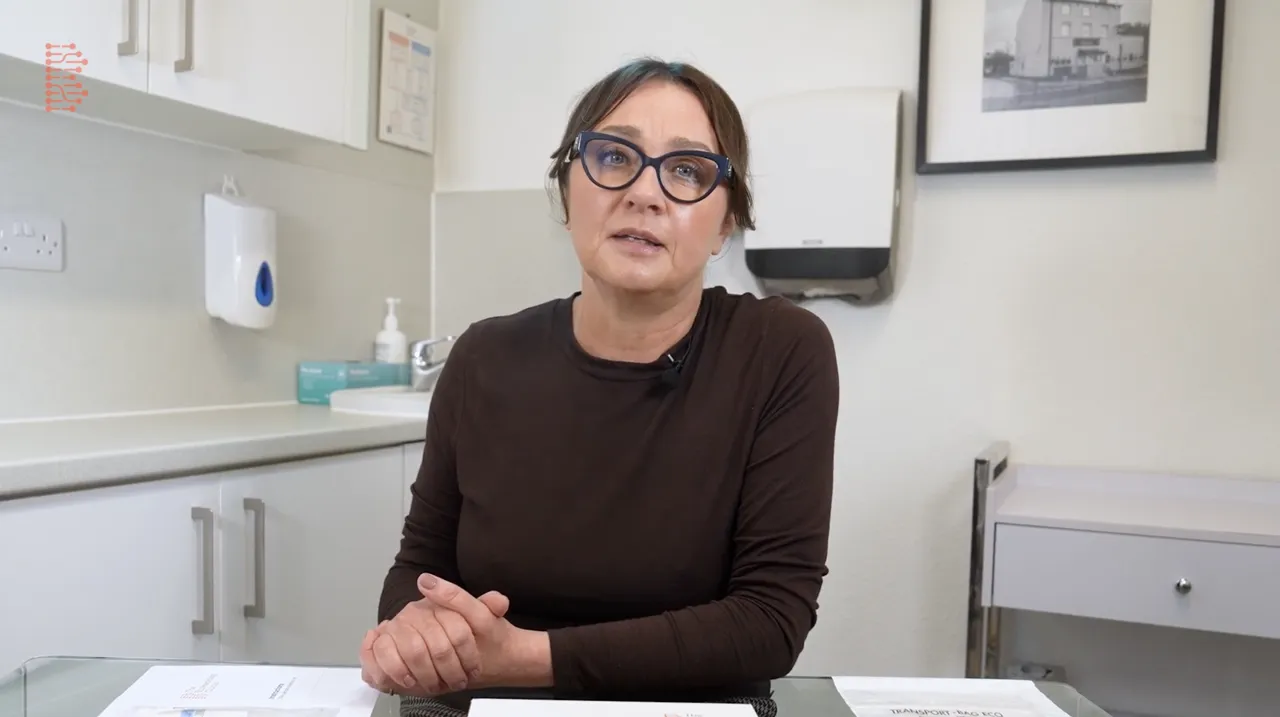 Clinic representative explaining the DNA testing process on camera as part of a professional tutorial video production.