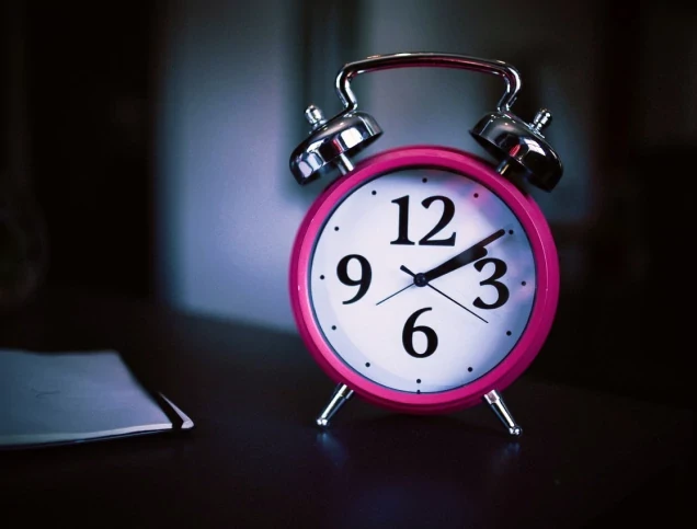A bedside alarm clock