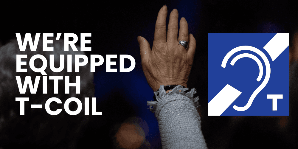 Back of senior woman worshiping and t-coil logo