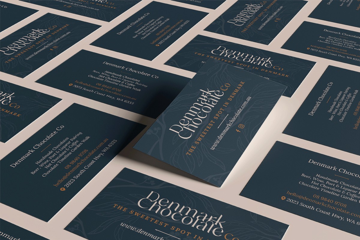 Premium brand identity for The Denmark Chocolate Company featuring nature-inspired logo and packaging